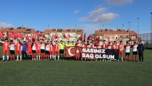Karaman'da sporcular "Başımız Sağ Olsun" pankartı açtı