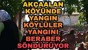 AKÇAALAN KÖYÜNDE BİR EVDE ÇIKAN YANGINI KÖYLÜLER SÖNDÜRÜYOR